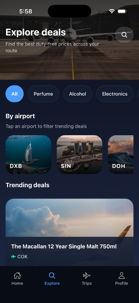 Navayro Explore — category pills, By airport tiles, trending Macallan deal at COK, active Explore tab